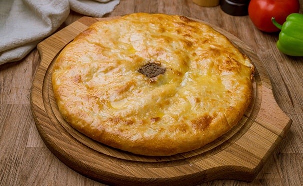 Скидка на Пироги и рулеты с различными начинками от пекарни «Бравый пекарь» со скидкой 55%
