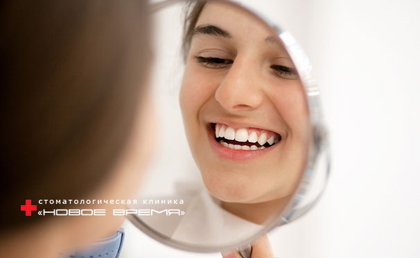 Скидка на УЗ-чистка зубов с чисткой Air Flow, отбеливание Amazing White и лечение кариеса в стоматологической клинике «Новое время». Скидка до 85%